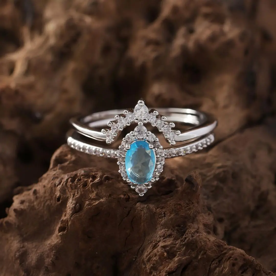 Rhodium Plated 2‑Piece Ring Set, Oval Aquamarine‑Tone Cubic Zirconia Halo Engagement Ring with V‑Shaped Stackable Wedding Band, Bridal Promise Jewelry Gift for Her