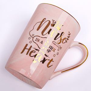 Biching Best Nurse Gifts for Women, Nurses' Day Gift, Nurse is a Work of Heart - 14oz Gold Printed Pink Ceramic Coffee Mug, Birthday Thank You Gift Present for Nursing School Student Graduation Nurses Day, Gift Boxed