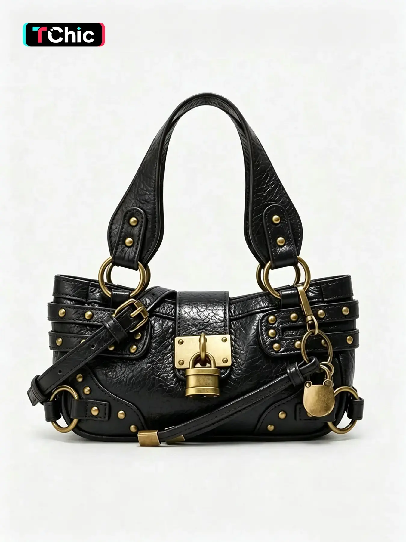 Niche design fashion vintage distressed studded handbag, trendy lock pendant decoration, high-quality feel with crossbody strap, versatile and stylish crossbody bag for everyday shopping, commuting, and travel.
