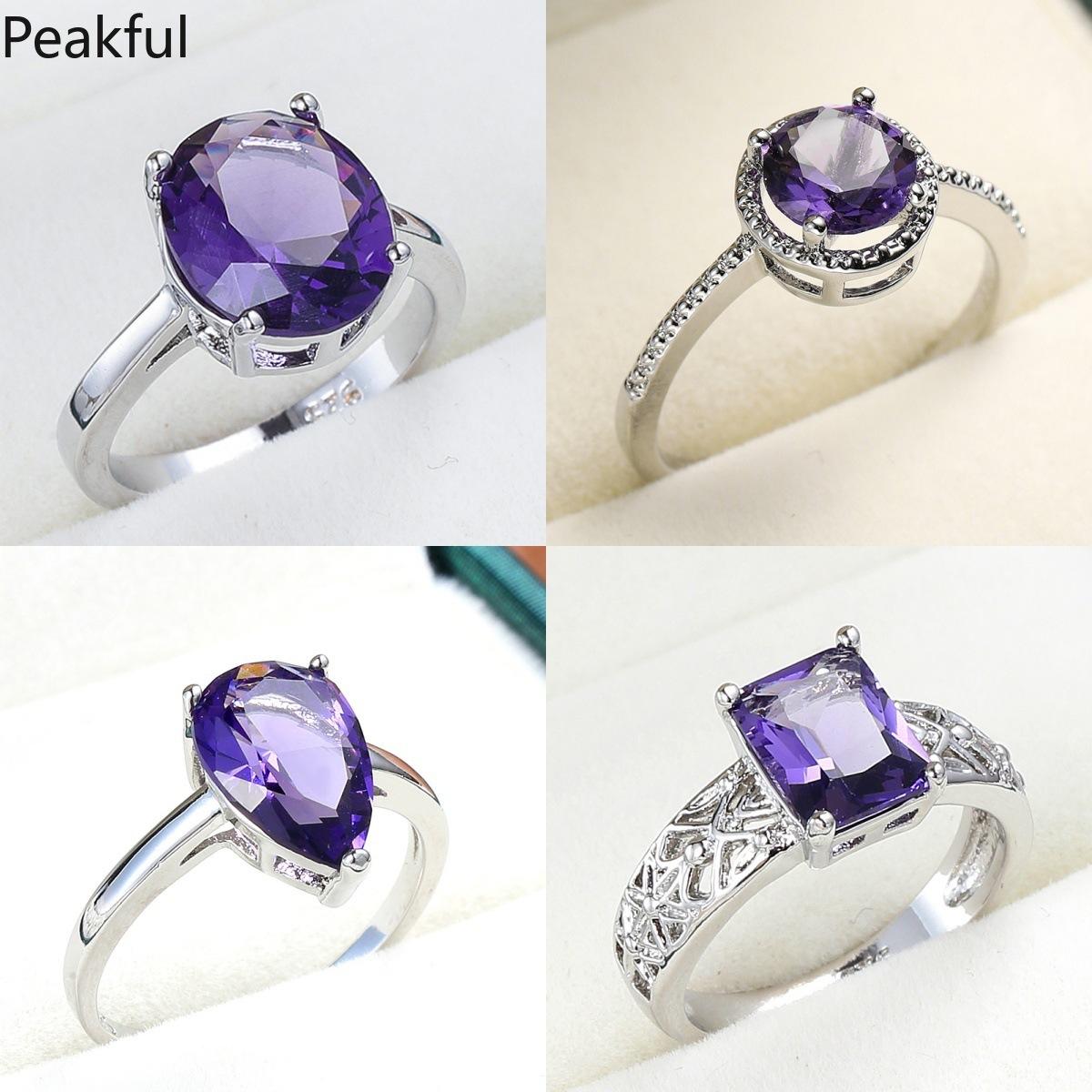 Elegant Amethyst Solitaire Statement Ring, Silver Plated Purple CZ Promise Band for Women, Classic Teardrop & Emerald Cut Designs, comfortable lightweight fit, great for everyday glamour, parties, anniversary gifts and formal styling