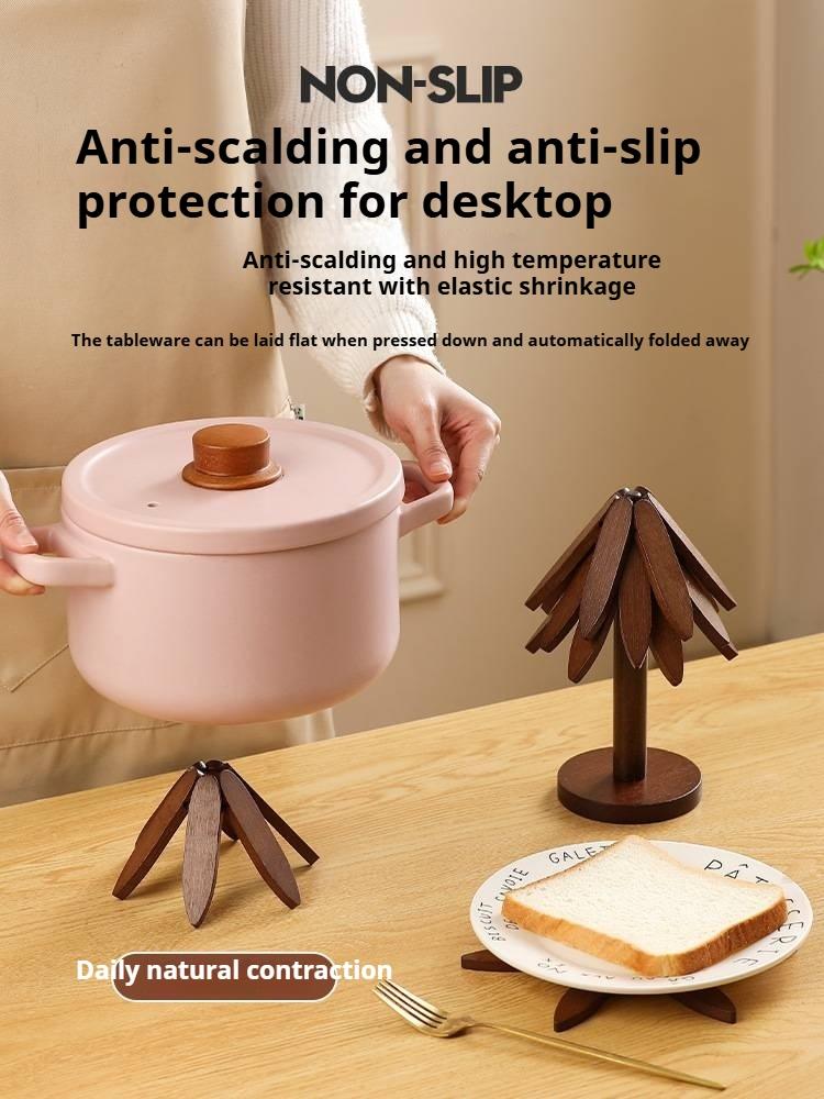 2026 Natural Tree Trivet Set - Christmas Tree Design! This heat - resistant set includes 4 walnut - wood trivets and 1 stand, stored like a Christmas tree. A foldable kitchen decor art, perfect for pots, bowls, coffee mugs, teapots and hot pots. 2026 Natural Tree Trivet Set - Christmas Tree Design! This heat - resistant set includes 4 walnut - wood trivets and 1 stand, stored like a Christmas tree. A foldable kitchen decor art, perfect for pots, bowls, coffee mugs, teapots and hot pots.