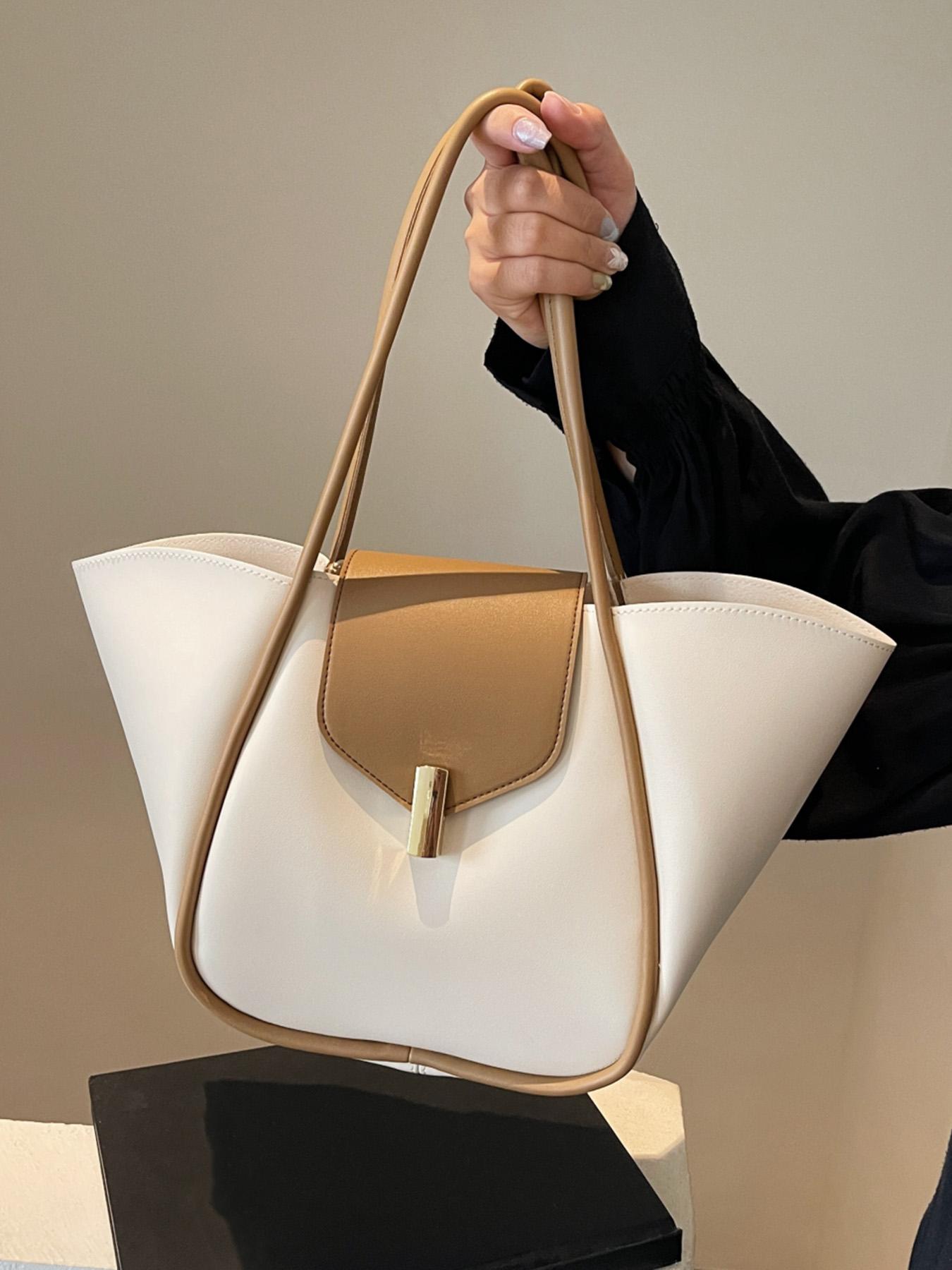 A niche and elegant shopping basket tote bag, a lock-button underarm bag, a simple solid color shoulder bag, a fashionable and textured shoulder commuter bag, a Casual Commuter Bag, suitable for daily matching, commuting and other scenarios