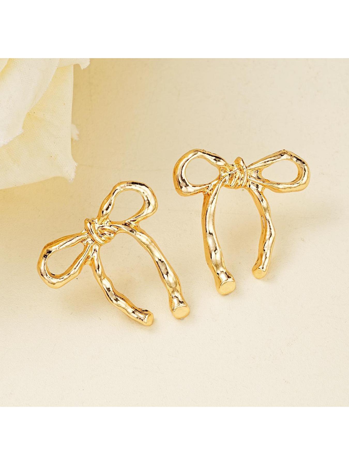 Hollowed-out bow earrings, women's stud earrings, simple and unique earrings, minimalist retro butterfly earrings.