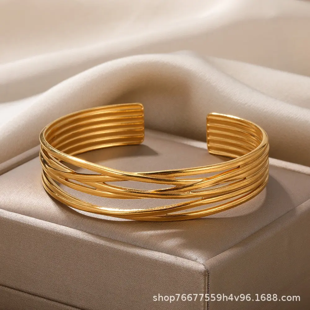 Multi layer woven cross opening bracelet