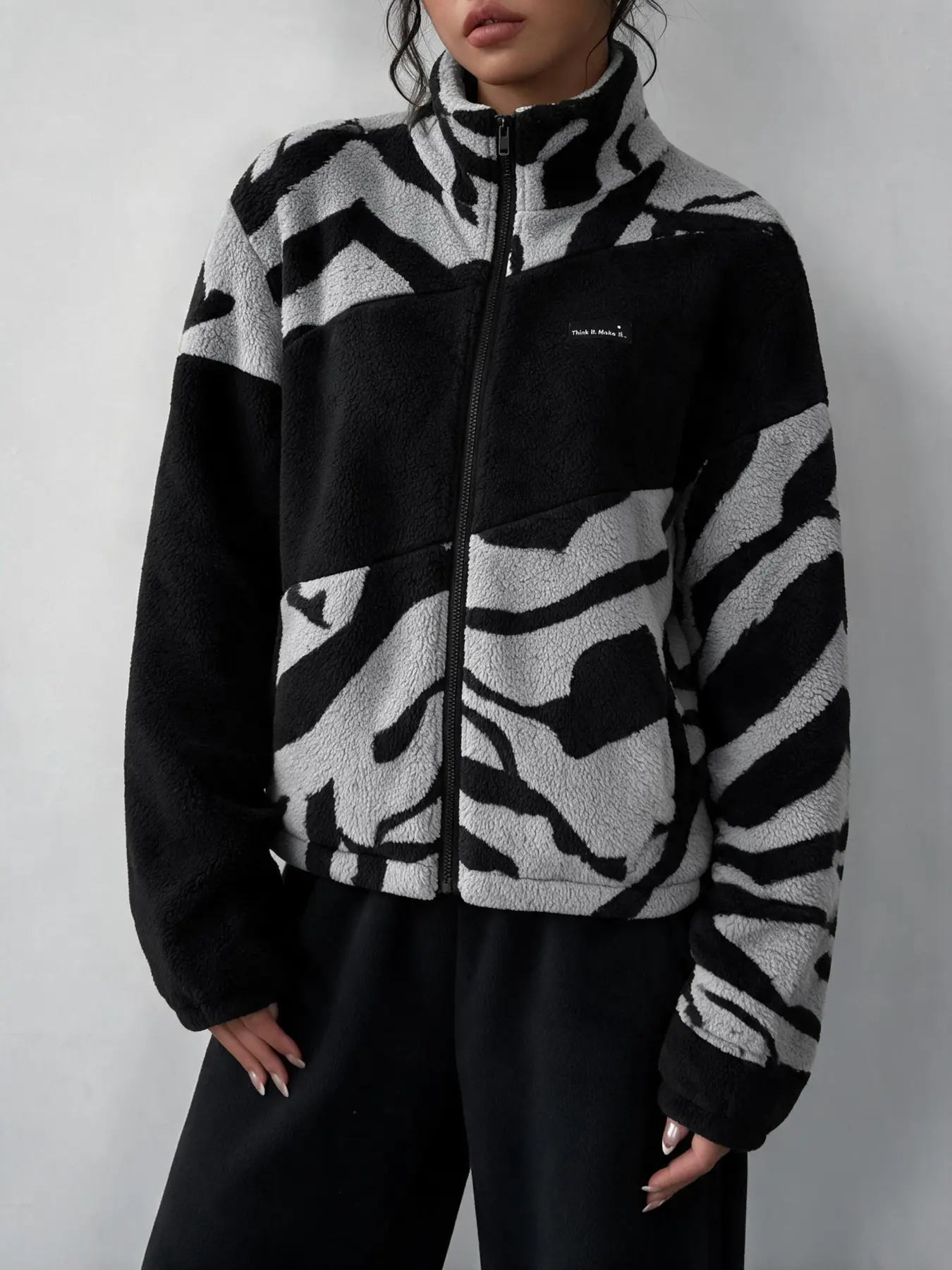 Women color block zebra print fleece jacket with stand collar and full zipper closure. Loose spliced design, soft plush fabric. Trendy streetwear outerwear, Fashion Outerwear, suitable for daily casual look and outdoor activities in fall and winter.