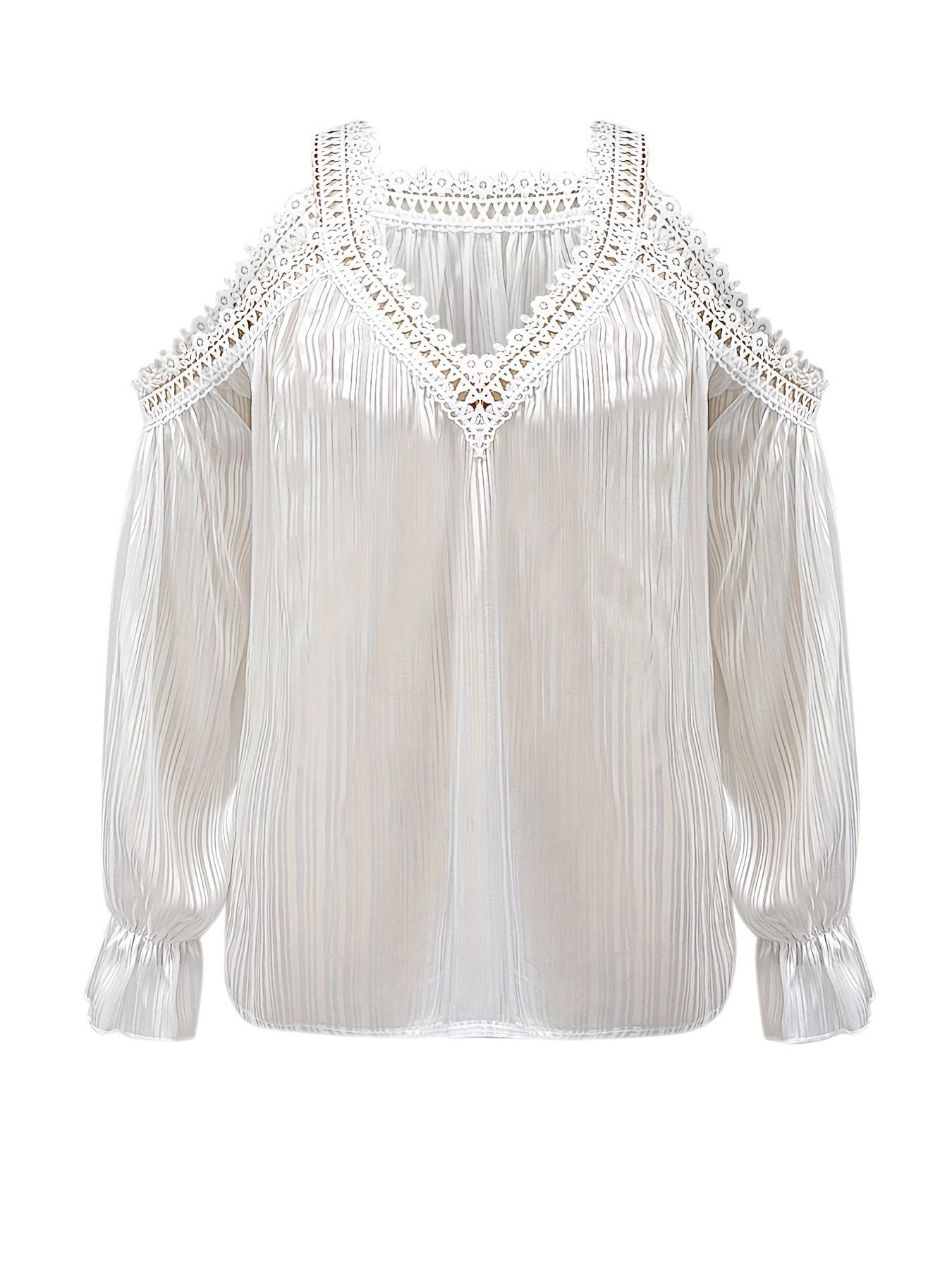 A women's white patchwork lace long-sleeved blouse, loose-fitting and versatile, ideal for casual and laid-back styles.