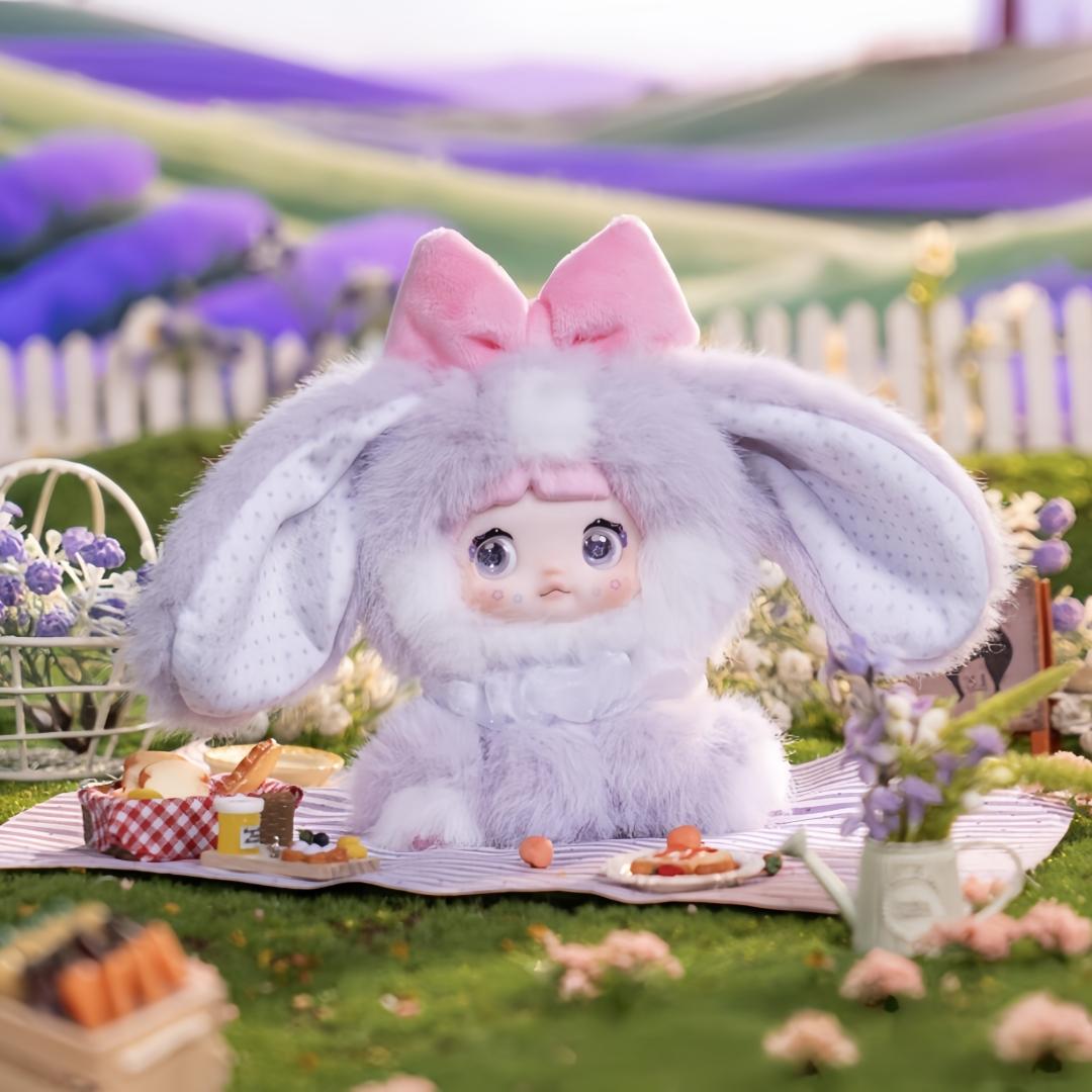 Nommi - Sitting Zoo Series New Plush Blind Box (1 Blind Box) Cute plush keychain with three sets of rotating eye patches for expression changes. Plush keychain blind box, trendy collectible figurine, gift. Suitable for car, desktop display,or bag charm