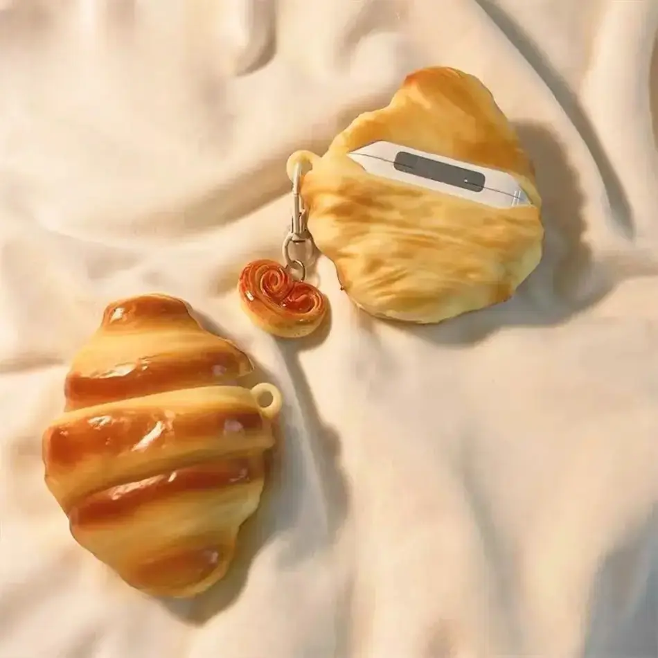 Cute 3D Croissant AirPods Case, Realistic Food‑Shaped Soft Silicone Protective Cover for Apple AirPods Series, Trendy Anti‑Drop Shockproof Earphone Shell, Lightweight Stylish Headphone Accessory with Decorative Charm, Fun Novelty Daily Carry Decor, Sweet