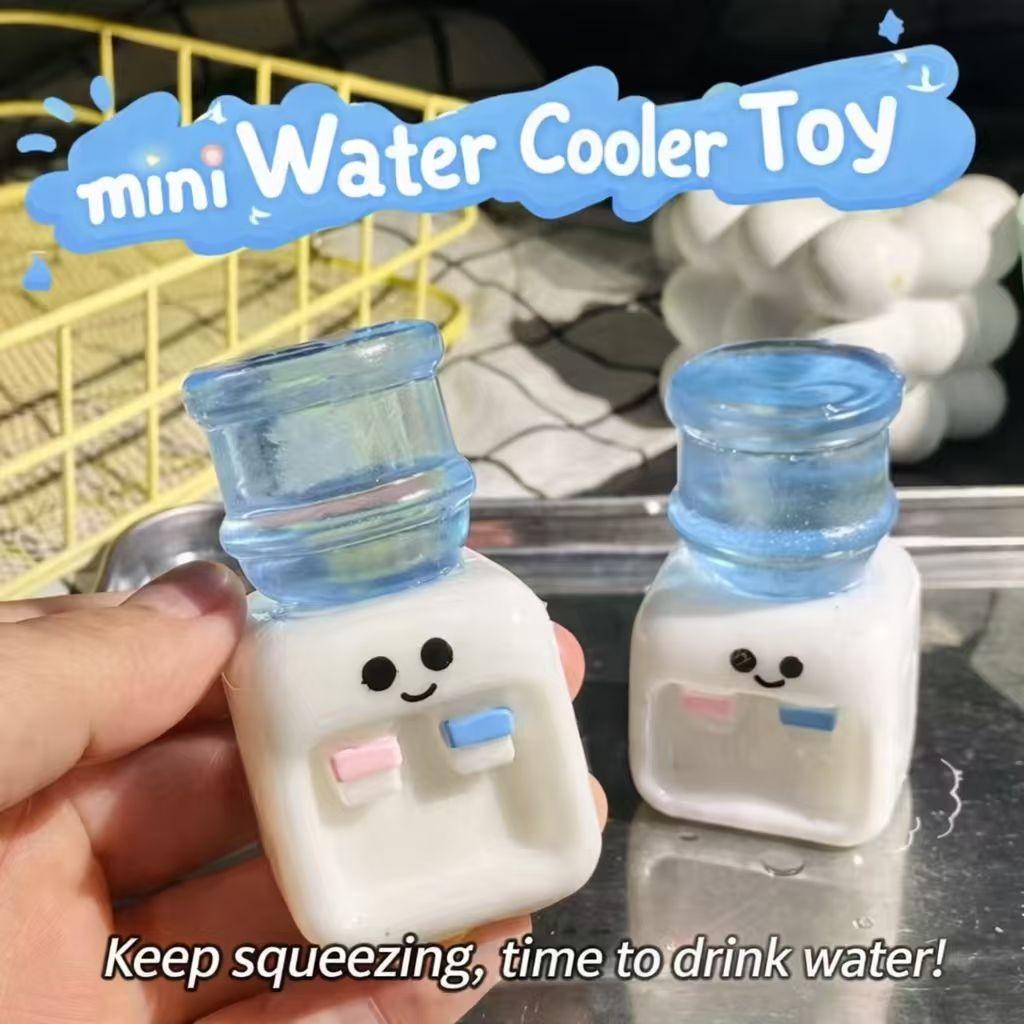 Cute Simulation Drinking Machine, a squeezable sensory toy with a soft, bouncy texture. Perfect for stress relief in various settings, a fun social icebreaker, and a creative desktop decoration.