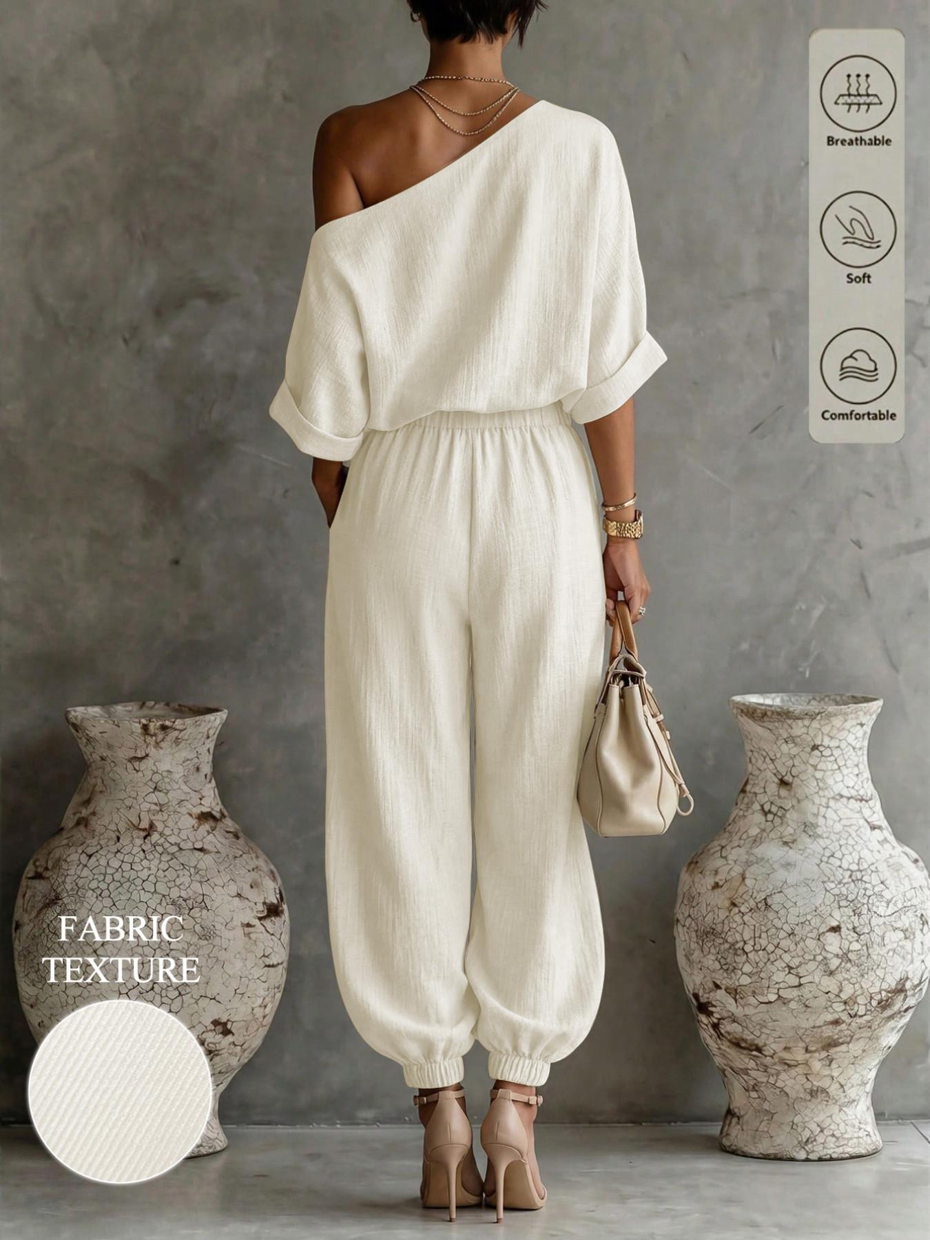 Women's solid color casual asymmetrical neck top paired with elastic waist trousers, a country-style two-piece set, Everyday suitable for daily commuting and all seasons.