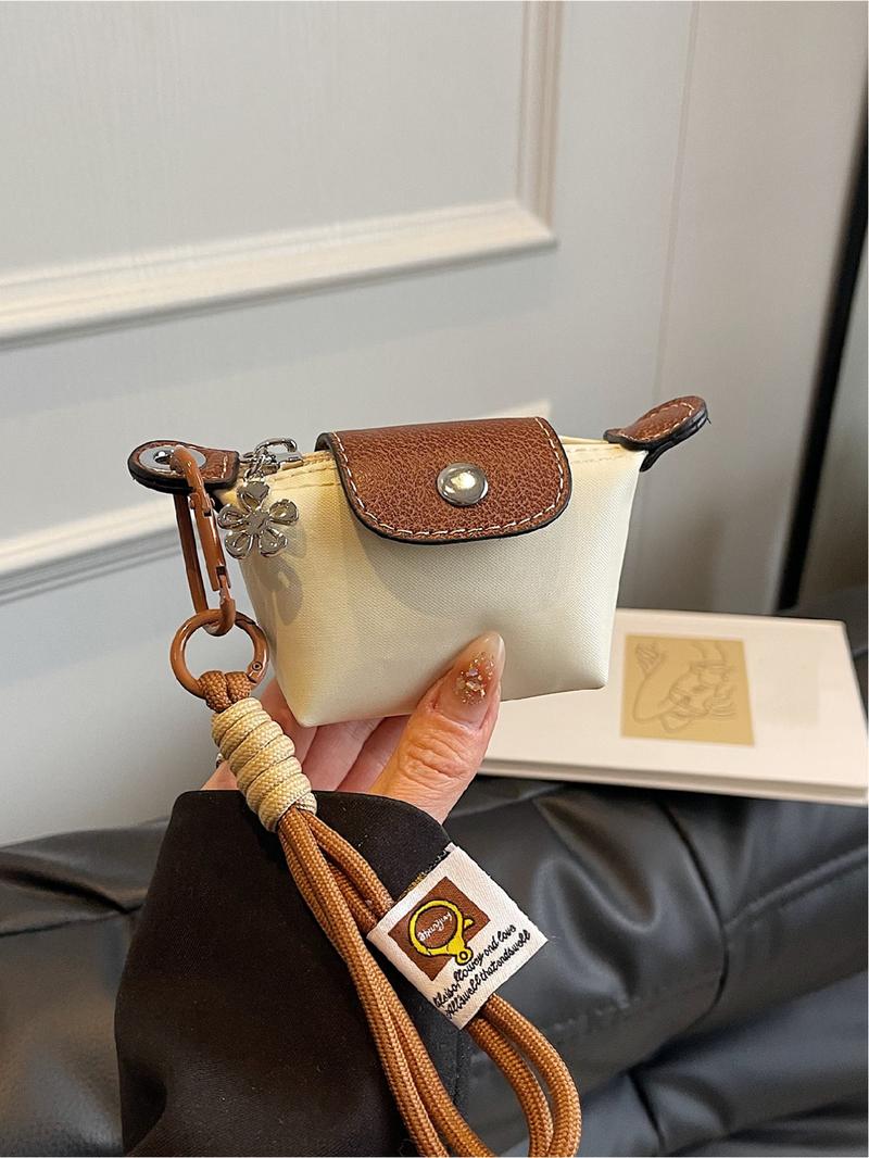 Mini women's flip button casual and compact handbag, wrist pocket, multiple colors to choose from, suitable for daily clothing matching, fashionable for going out.