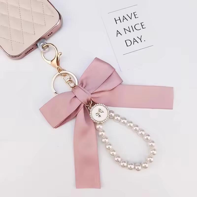 Creative Bow, Pearl Chain Keychain, Women's Fashion Bag Pendant, Car Keychain, Phone case chain, Personalized Ribbon Necktie, Fashionable Alloy Keychain