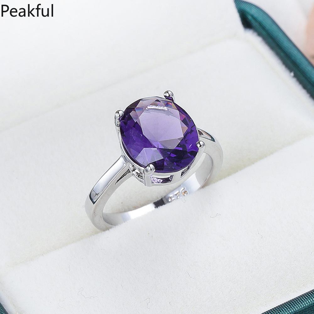 Elegant Amethyst Solitaire Statement Ring, Silver Plated Purple CZ Promise Band for Women, Classic Teardrop & Emerald Cut Designs, comfortable lightweight fit, great for everyday glamour, parties, anniversary gifts and formal styling