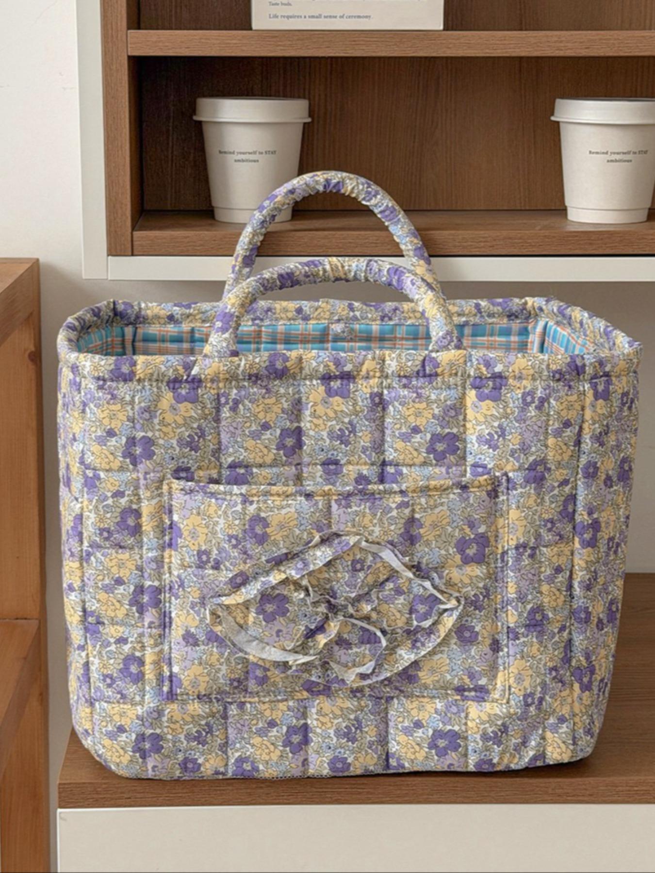 Large capacity floral quilted storage basket with plaid lining and multi-purpose organizer to store makeup, toiletries and daily essentials, perfect for bedrooms, bathrooms, offices and travel