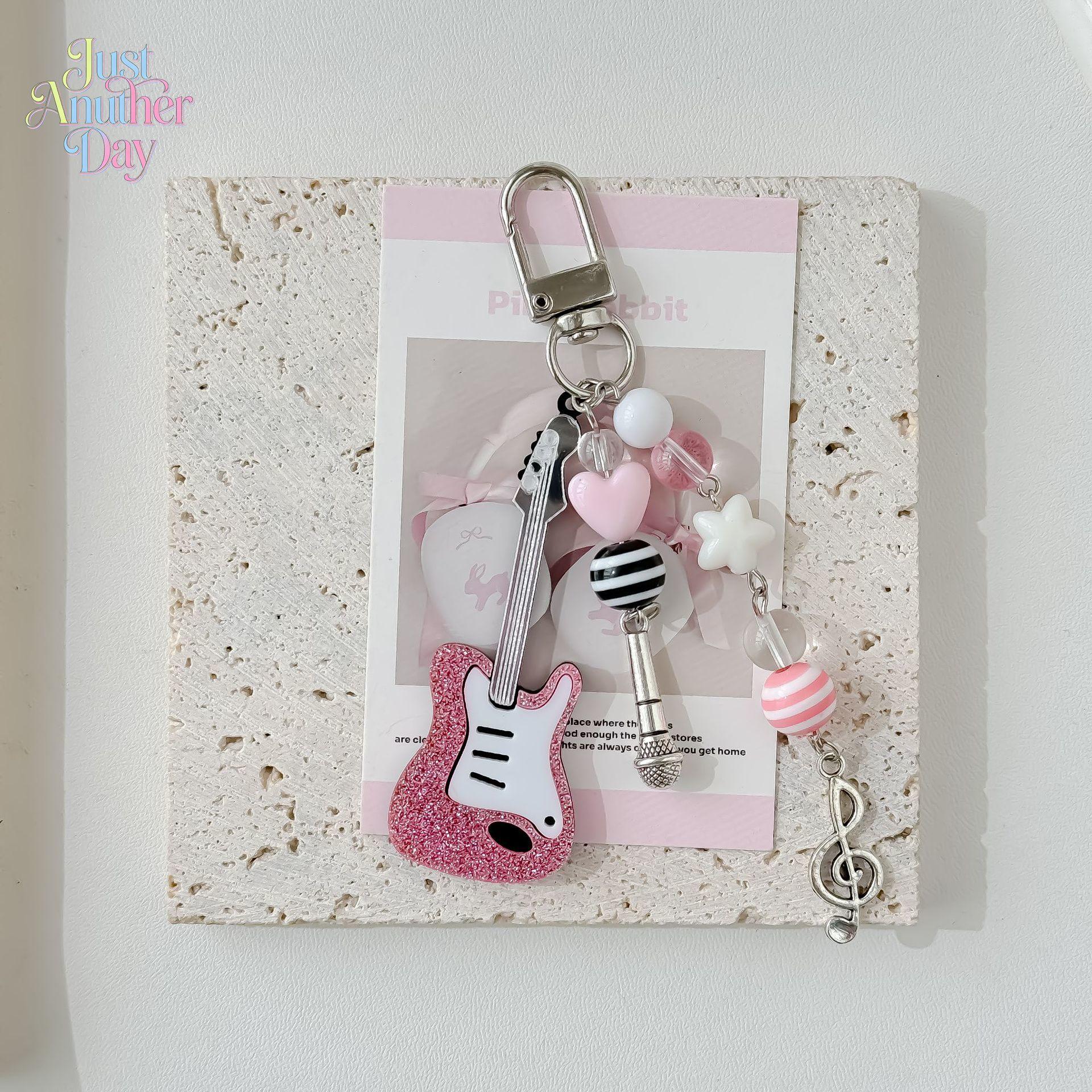 Y2K Pink Guitar Phone Charm, Millennial Style Beaded Keychain with Star & Music Note Details, Cute Bag & Photocard Holder Accessory