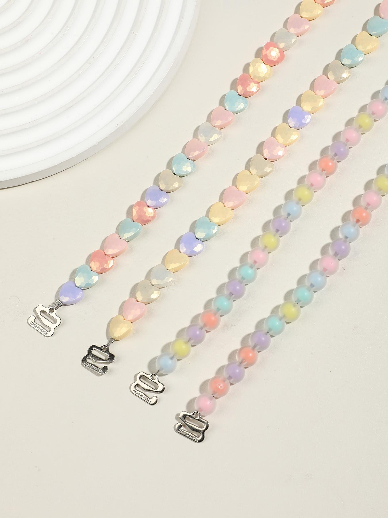 Macaron-colored heart-shaped round bead bra straps, candy-hued resin-beaded invisible lingerie straps, non-slip and wearable as an exposed accessory—perfect for everyday outfits and summer styling.