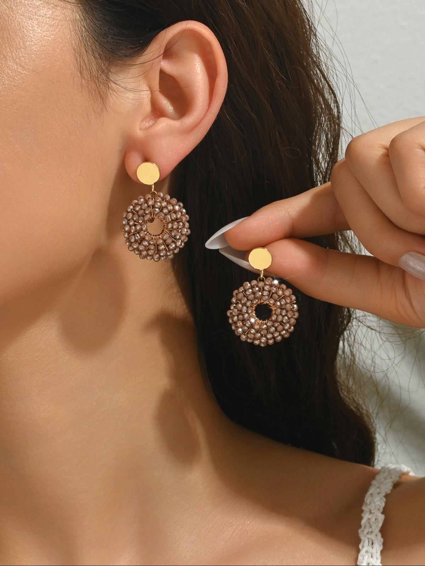 A pair of pure handmade, beaded circular dangle earrings featuring a dazzling "Bling-Bling" effect and a chic Bohemian resort style. These vintage-inspired, ethnic-style earrings offer a unique, versatile, and minimalist aesthetic—exuding elegance