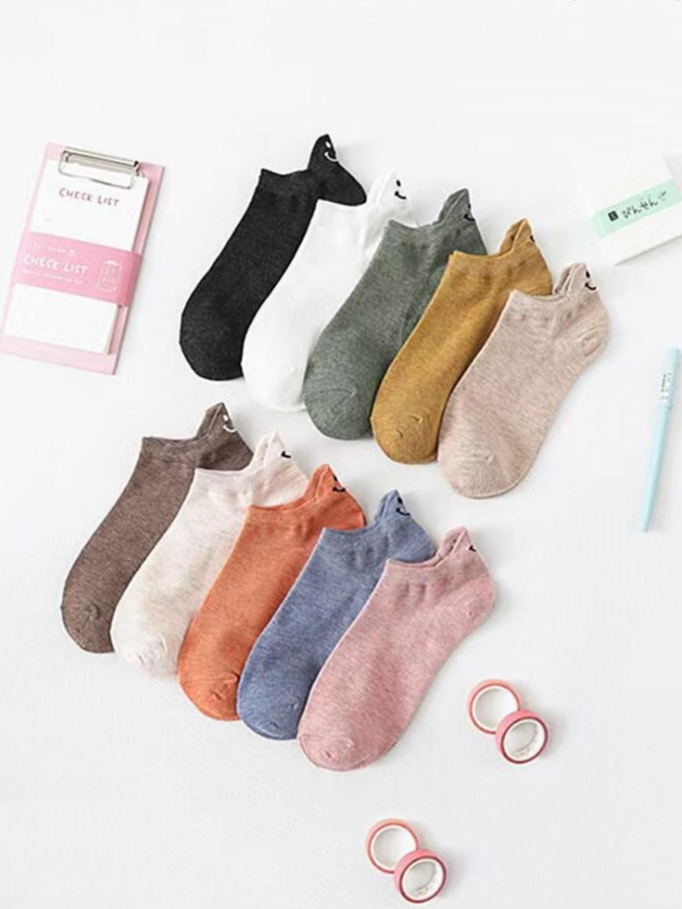 Men's and women's multi-color no-show socks with smiley face on the heel, 20 pairs sock packs, breathable, sweat-absorbent, comfortable, non-slip, short socks. Fashionable design perfectly meets the daily casual wear needs of men and women.
