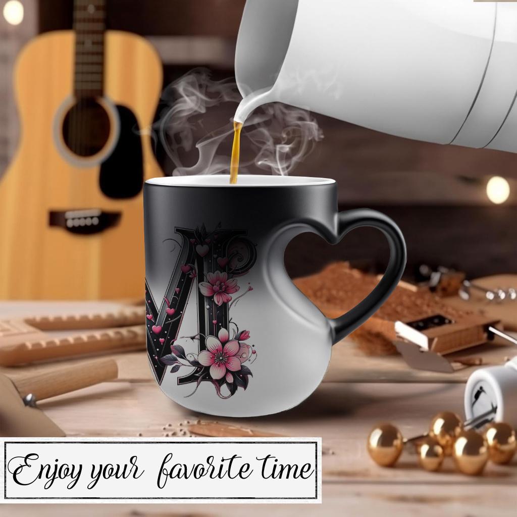 Heat-changing ceramic mug with pink butterfly and floral motif, heart-shaped handle, 11 oz/330 ml capacity. This color-changing thermos is perfect for hot and cold beverages.