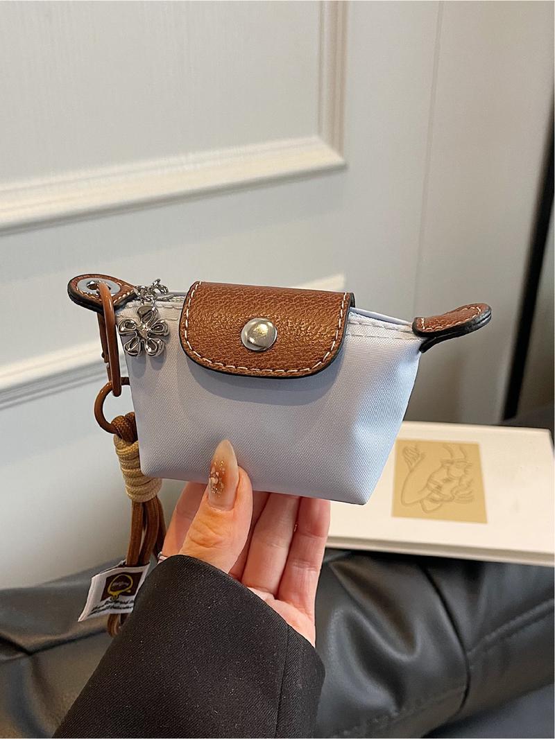 Mini women's flip button casual and compact handbag, wrist pocket, multiple colors to choose from, suitable for daily clothing matching, fashionable for going out.