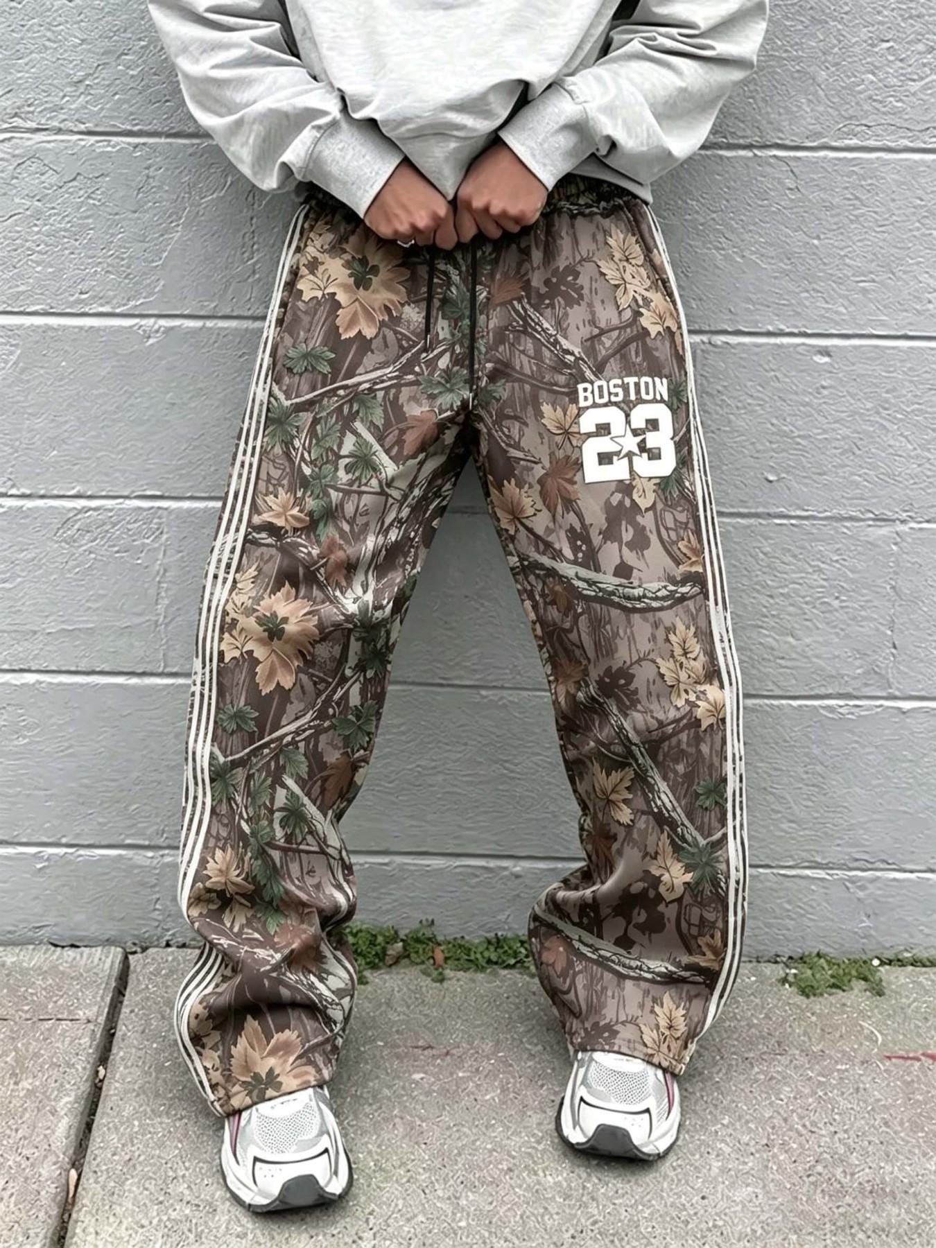 🔥 Virus Boston 23 Camouflage Tracking Pants 🔥|  Essential Y2K streetwear! Unique forest camouflage print with 3 stripe details and "BOSTON 23" logo | Comfortable wide leg fit, perfect for street style and daily styling 🔥