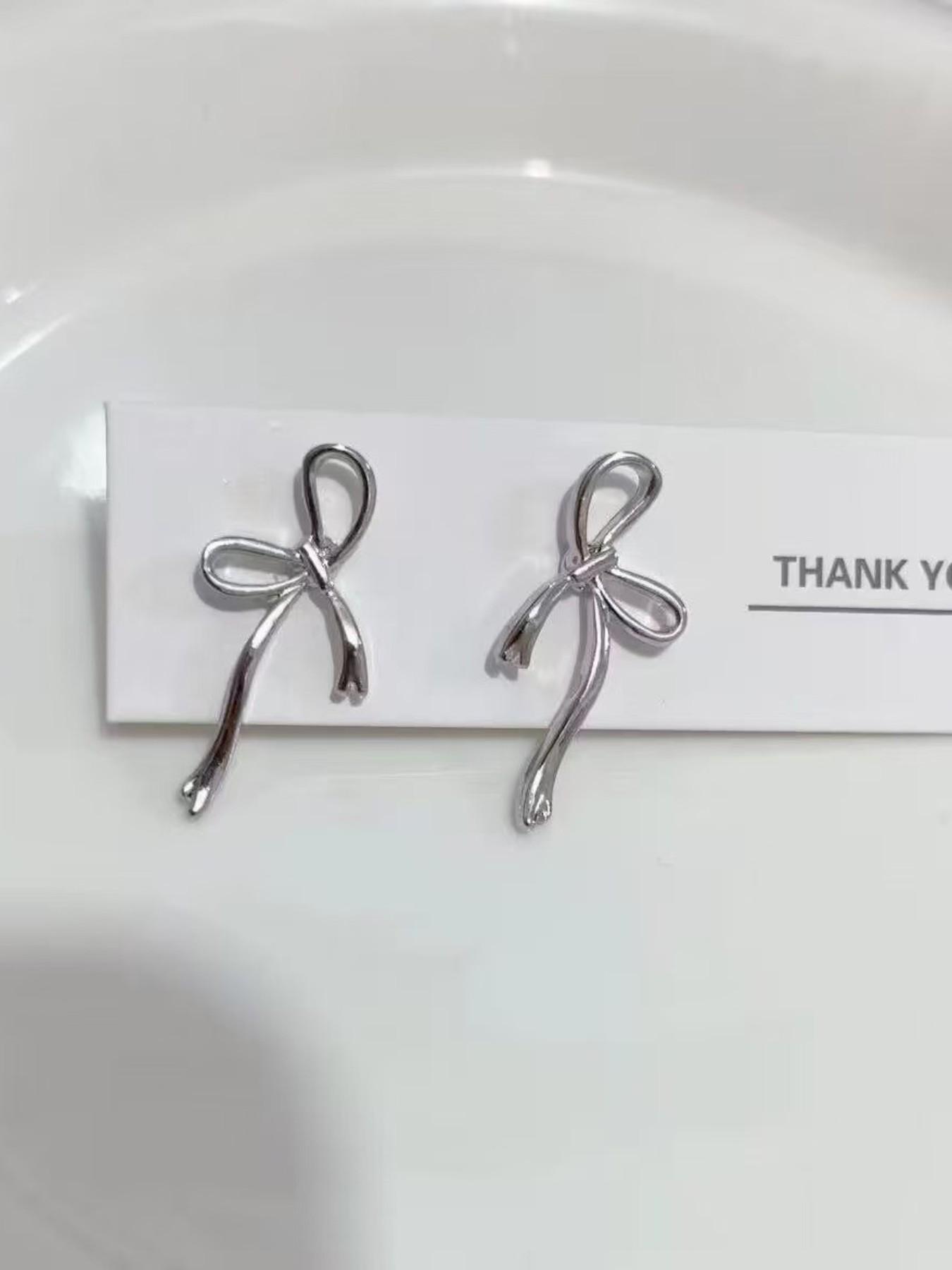 Minimalist Silver Color Bow Stud Earrings for Women, Unique Hollow Design, Elegant All-Season Jewelry, Versatile Commute Ear Accessories