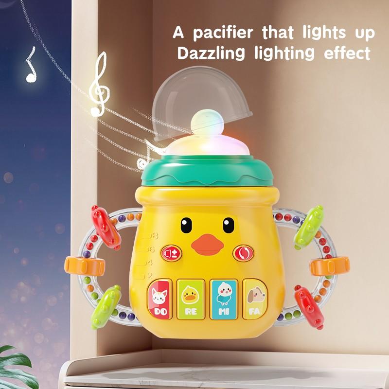 Baby Musical Toy, Cute Baby Bottle Learning Toy, Interactive Duck Shaped Light Up and Music Rattle Toy, Teething Musical Toys, Christmas Stocking Stuffers Gift