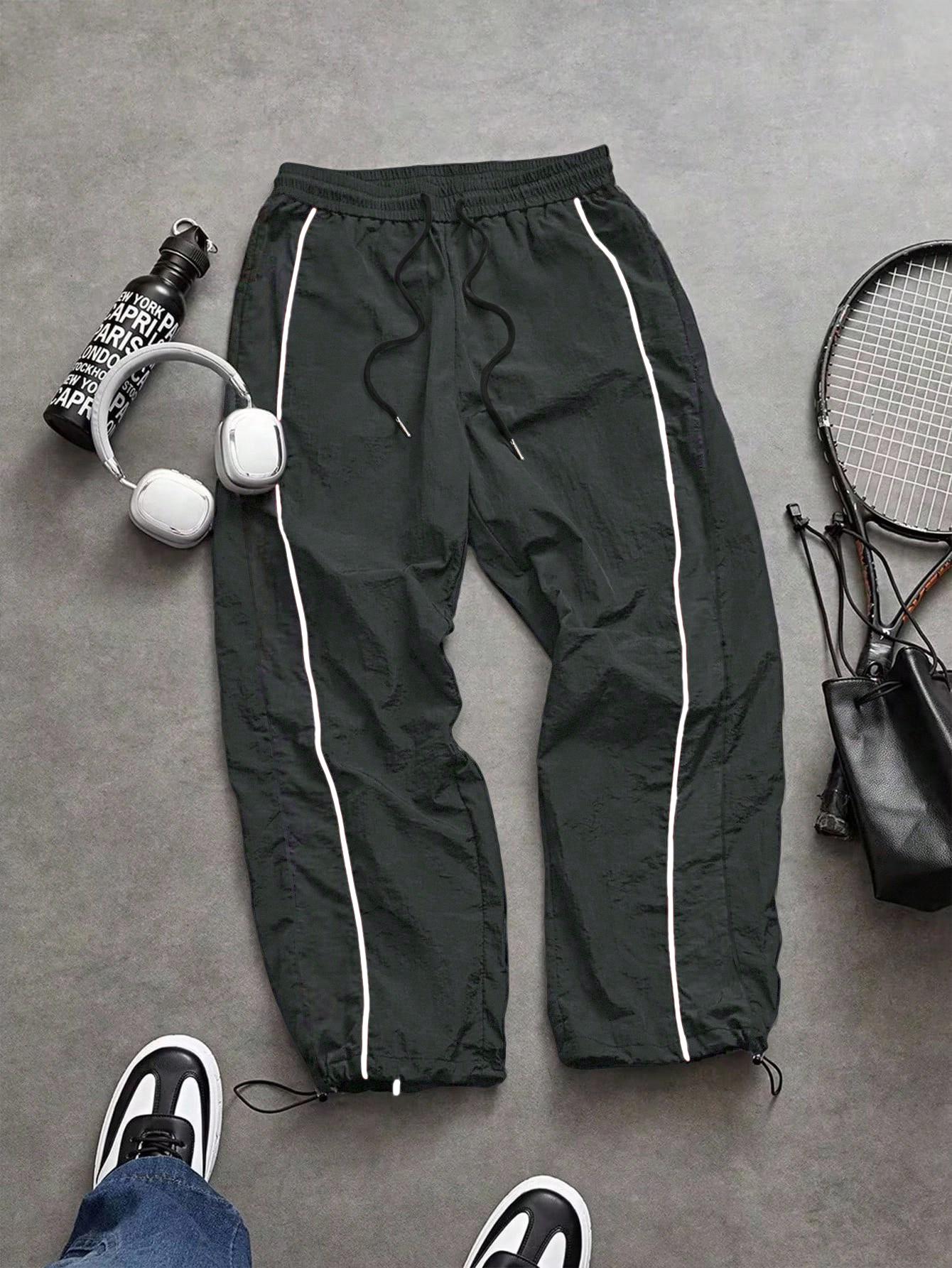 Men's lightweight, breathable, reflective printed wide-leg pants with adjustable leg openings and drawstrings, elastic waist, casual pants suitable for outdoor sports, fitness, campus commuting, street fashion, and versatile long pants