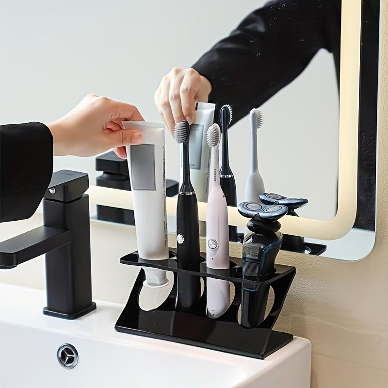 1 Pc Electric Toothbrush Organizer Stand – Multi-function storage rack for toothbrush, razor and toothpaste. Compact bathroom countertop holder, perfect for keeping toiletries neat and organized at home.