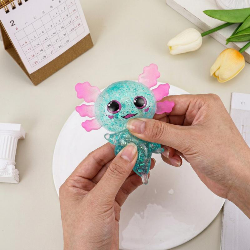 Axolotl squishy toy, made of glittery silicone, cute and adorable, chibi-style salamander design, slow-rebound squishy for stress relief, perfect for students and office workers, a great children's gift, and a stress-relieving toy.