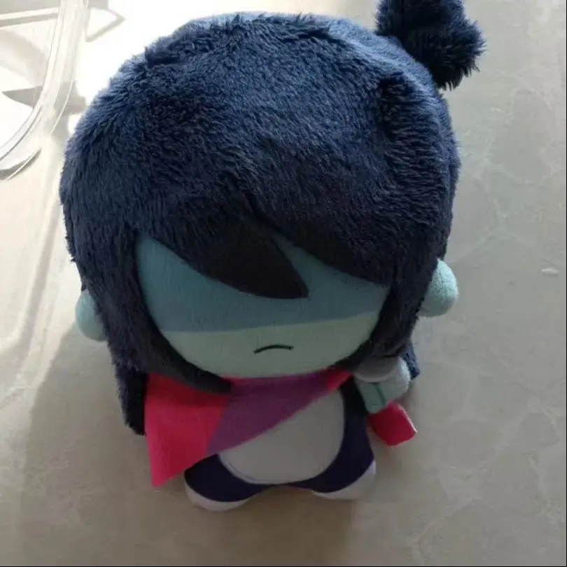 10cm Deltarune Kris Plush Toy Soft Stuffed Toy with Pink Scarf Blue Hair Anime Game Character Plushie for Fans Birthday Gift