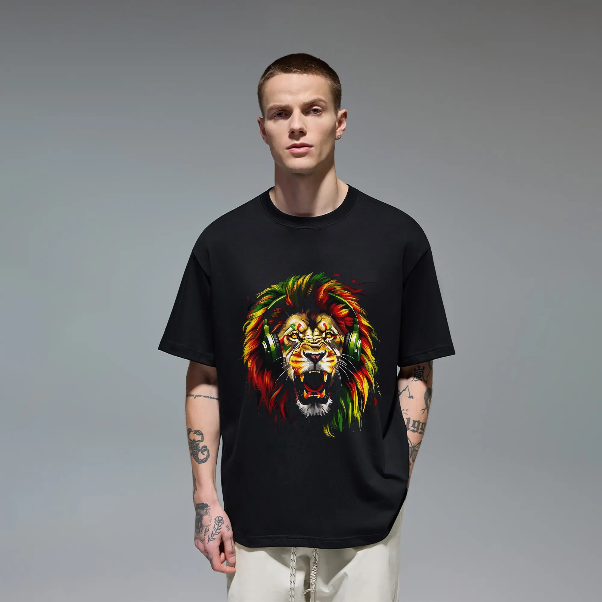 Rasta Lion T-Shirt Reggae Music Roaring Lion With Headphones Graphic Tee Red Yellow Green African Colors Novelty Gift for Men Women DJ Musician Rastafarian Culture Animal Art Festival Concert Outfit Casual Streetwear Black Top