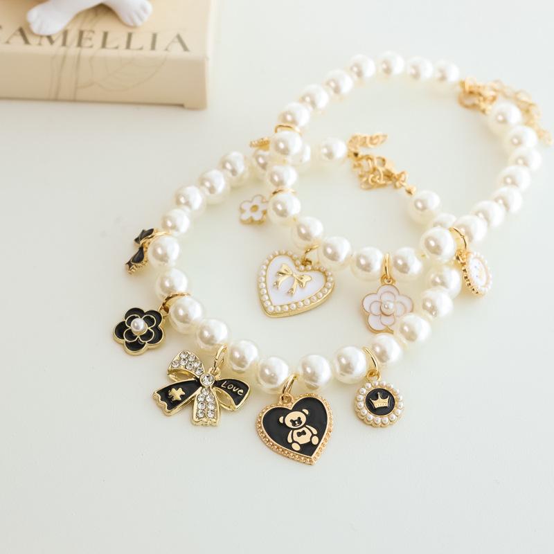 Pet Pearl Necklace Collar |   Vintage Luxury Bow & Camellia Pet Jewelry Pet Collar |   Pearl Necklace Collar for Cats & Dogs |   Vintage Luxury Bow |   Heart Charm |   Noiseless Design |   Camellia Decor  Wedding Birthday Party Photo Props |   Fashion Pet