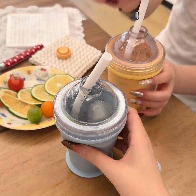 Food-grade silicone folding ice ball cup - dual-purpose ice water drinking cup. Two-in-one functional summer portable water cup with a straw.