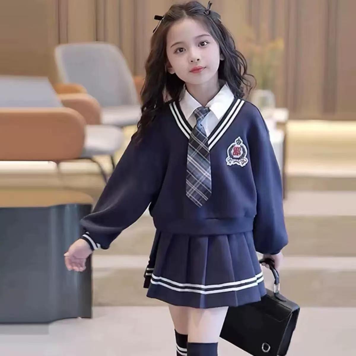 Girl's Teen Campus Style 2-Piece Set - Short Loose-Fit Long-Sleeve Sweatshirt Jacket, Striped Pleated Skirt with Tie