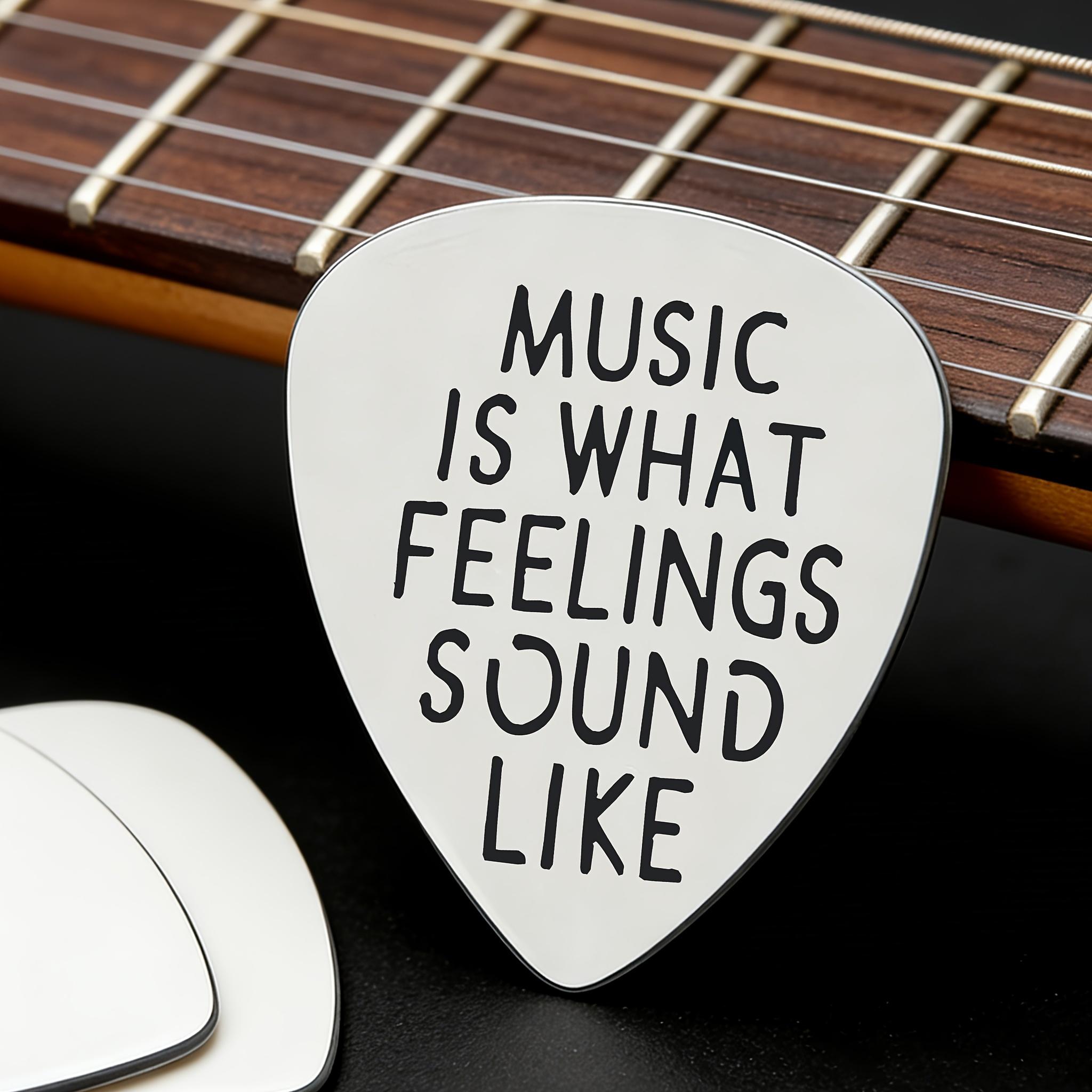 Stainless steel guitar pick, engraved with "MUSIC IS WHAT FEELINGS SO LIKE" literary music copy, suitable for music lovers, guitarists, birthdays, graduation, Christmas, music festivals gifts