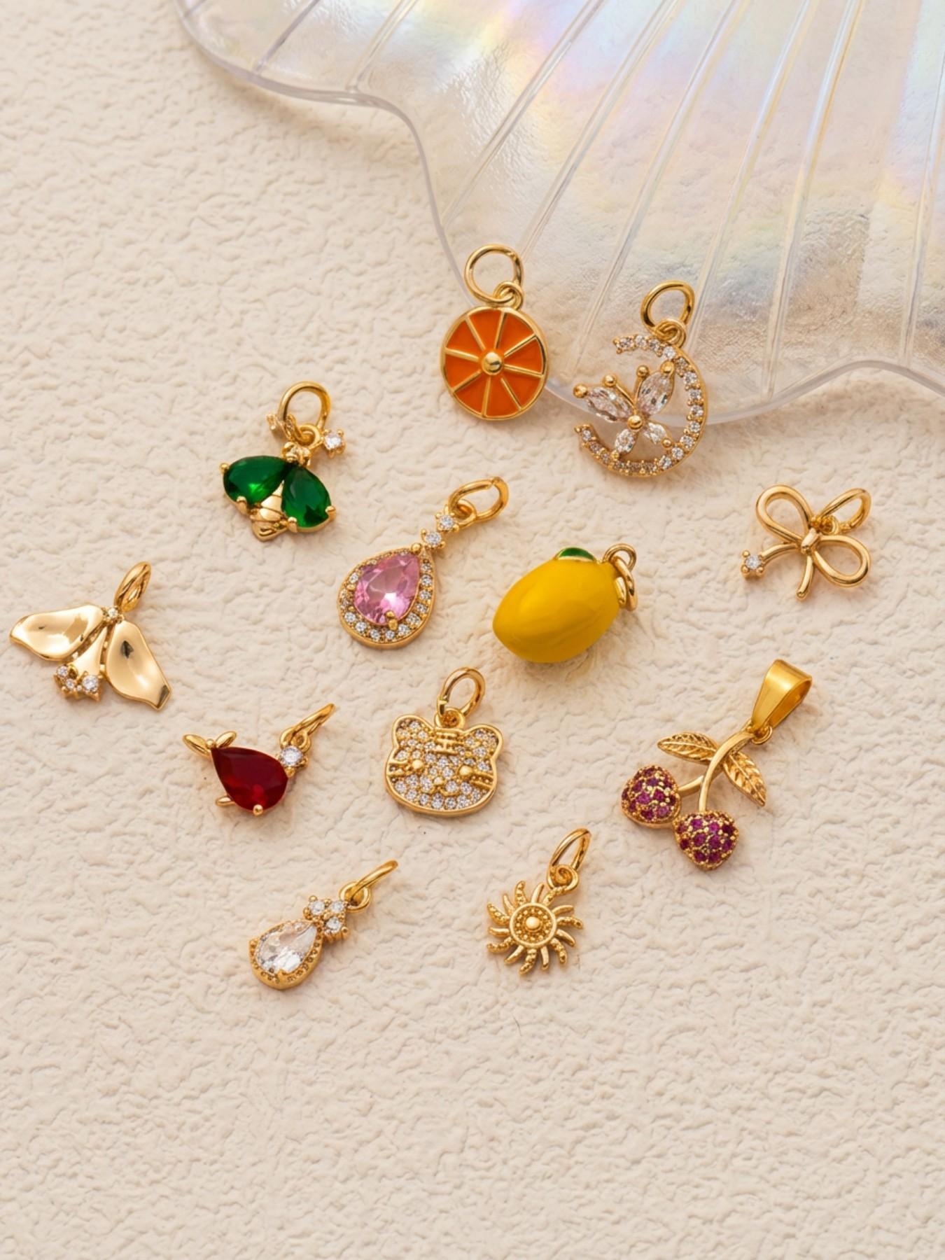 1PC stylish commuter bohemian style pendant, set with synthetic cubic zirconia, featuring a bow, butterfly moon, lemon cherry, and other fruit motifs. Made of 18K gold-plated copper, this DIY fashion accessory is suitable for keychains, bags, and jewelry.