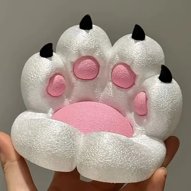 1 cute cat paw shaped desktop ornament decoration, which can be used as a mobile phone and tablet holder, and can be used as a home office desktop ornament decoration