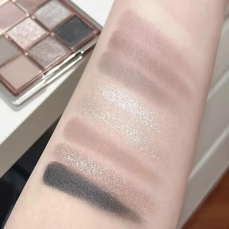 9-color eyeshadow palette - a blend of smoky grey, brown and pink tones, mousse eyeshadow, matte and shimmery finishes, fine Shimmery glitter, low saturation all-in-one palette with matte earthy tones, fine powder texture that doesn't fly off