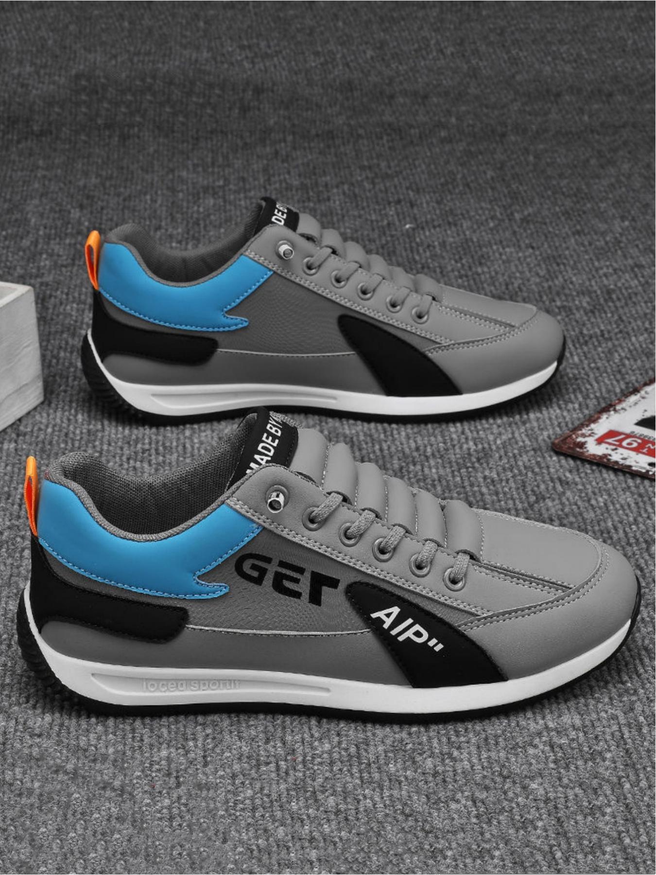 Men's casual sports shoes, simple splicing design for breathability and comfort, contrasting tongue and eye-catching letter logo for fashionable embellishment, ideal for light commuting and sports wear