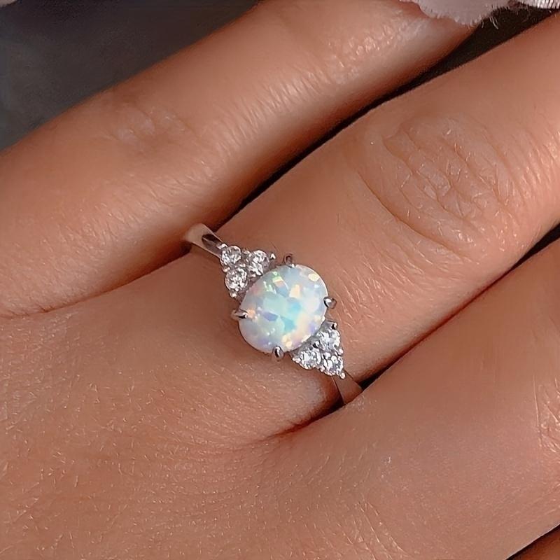 Classic and elegant oval inlaid imitation Australian treasure women's ring suitable for daily parties, banquets, engagements, women's jewelry gifts