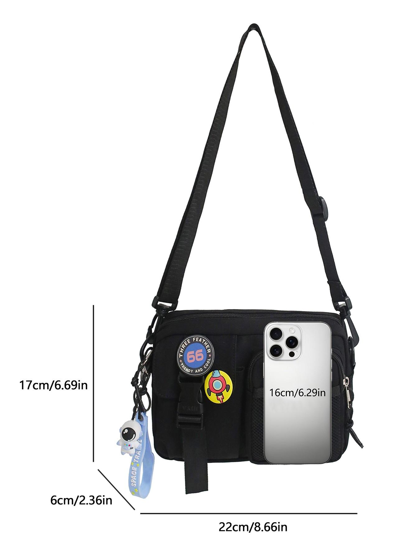 Black fashionable casual simple shoulder bag, practical and atmospheric texture crossbody bag, with badge and alien pendant pendant design, can accommodate mobile phones and keys, suitable for walking and shopping