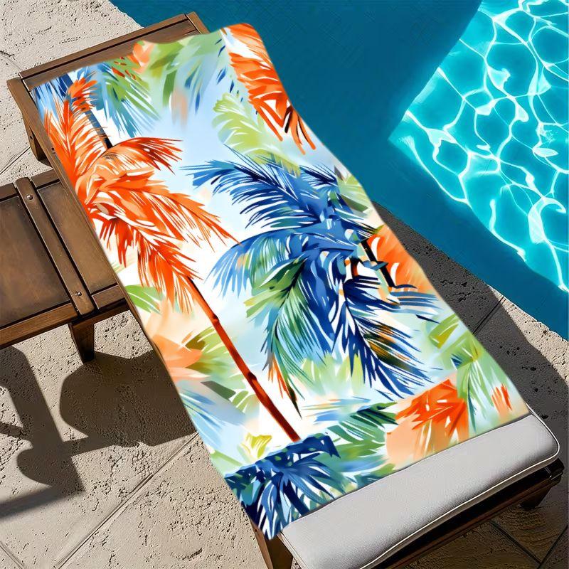 A Large Beach Towel Featuring a Colorful Palm Leaf Design (Light Blue Background with Blue, Green, And Orange Colors) with Sand-Resistant Features. It Is Soft, Lightweight, And Quick-Drying, Perfect For, Travel, And Outdoor Settings
