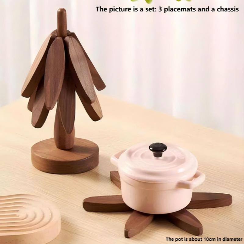 2026 Natural Tree Trivet Set - Christmas Tree Design! This heat - resistant set includes 4 walnut - wood trivets and 1 stand, stored like a Christmas tree. A foldable kitchen decor art, perfect for pots, bowls, coffee mugs, teapots and hot pots.