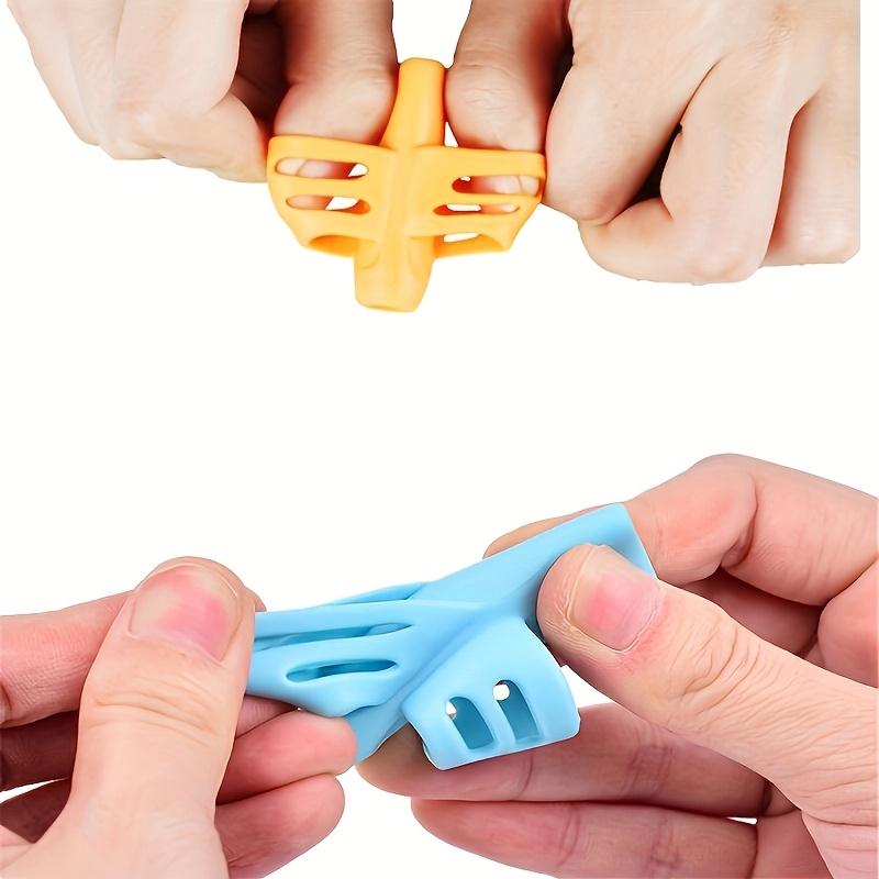 4pcs Multi-color Pencil Holder for Primary School Students Children's Stationery Soft Glue Writing Posture Corrector Pen Holder for Writing Posture Correction Office Supplies Classroom Supplies Desk Supplies
