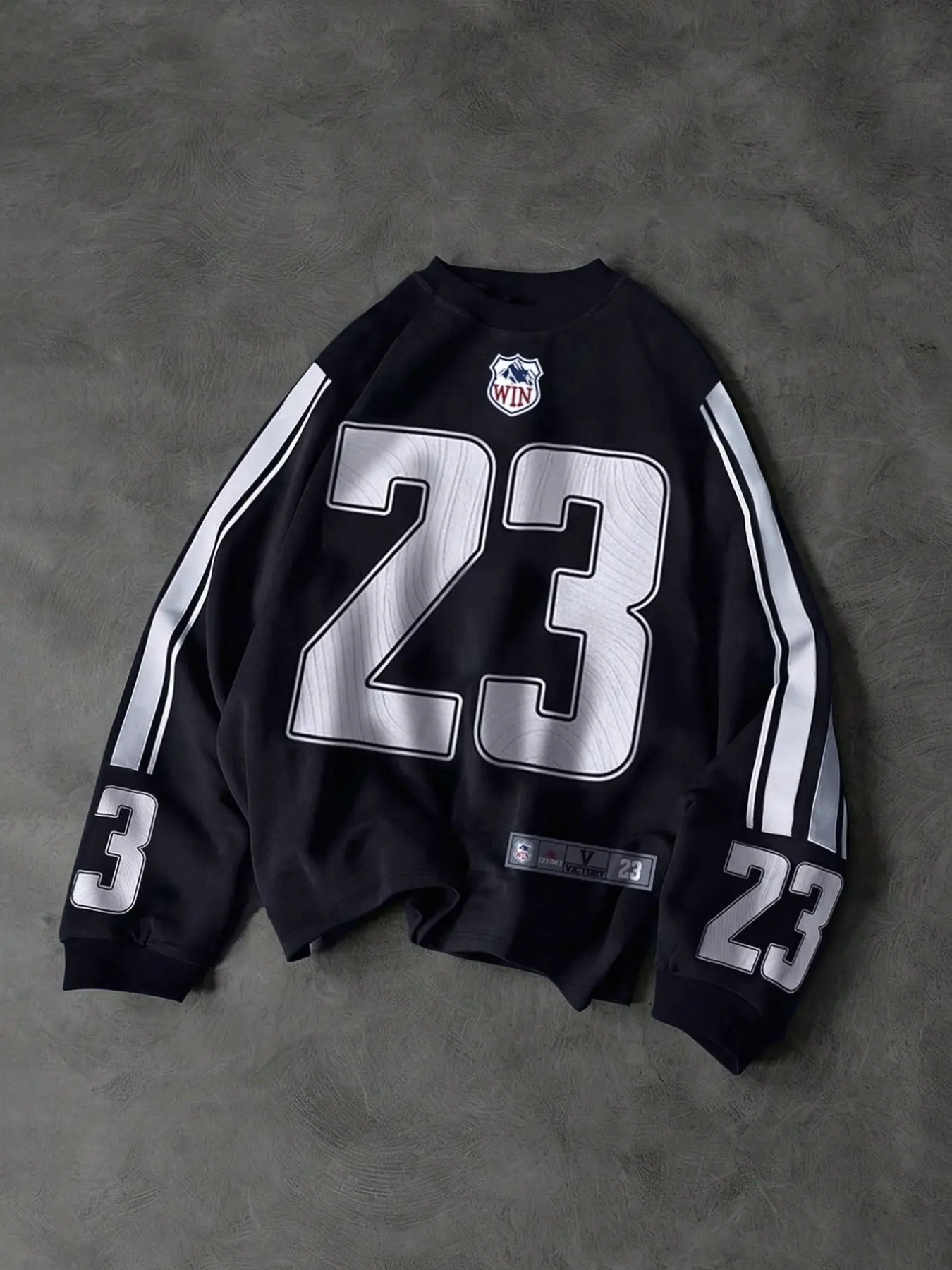 Unisex Y2K Vintage Rugby Sweatshirt, black with contrasting white number graphic print on the chest. Crew neck, ribbed cuffs, loose oversized long-sleeve pullover. Vintage sport jersey-style streetwear top, suitable for daily looks, night outings, concert