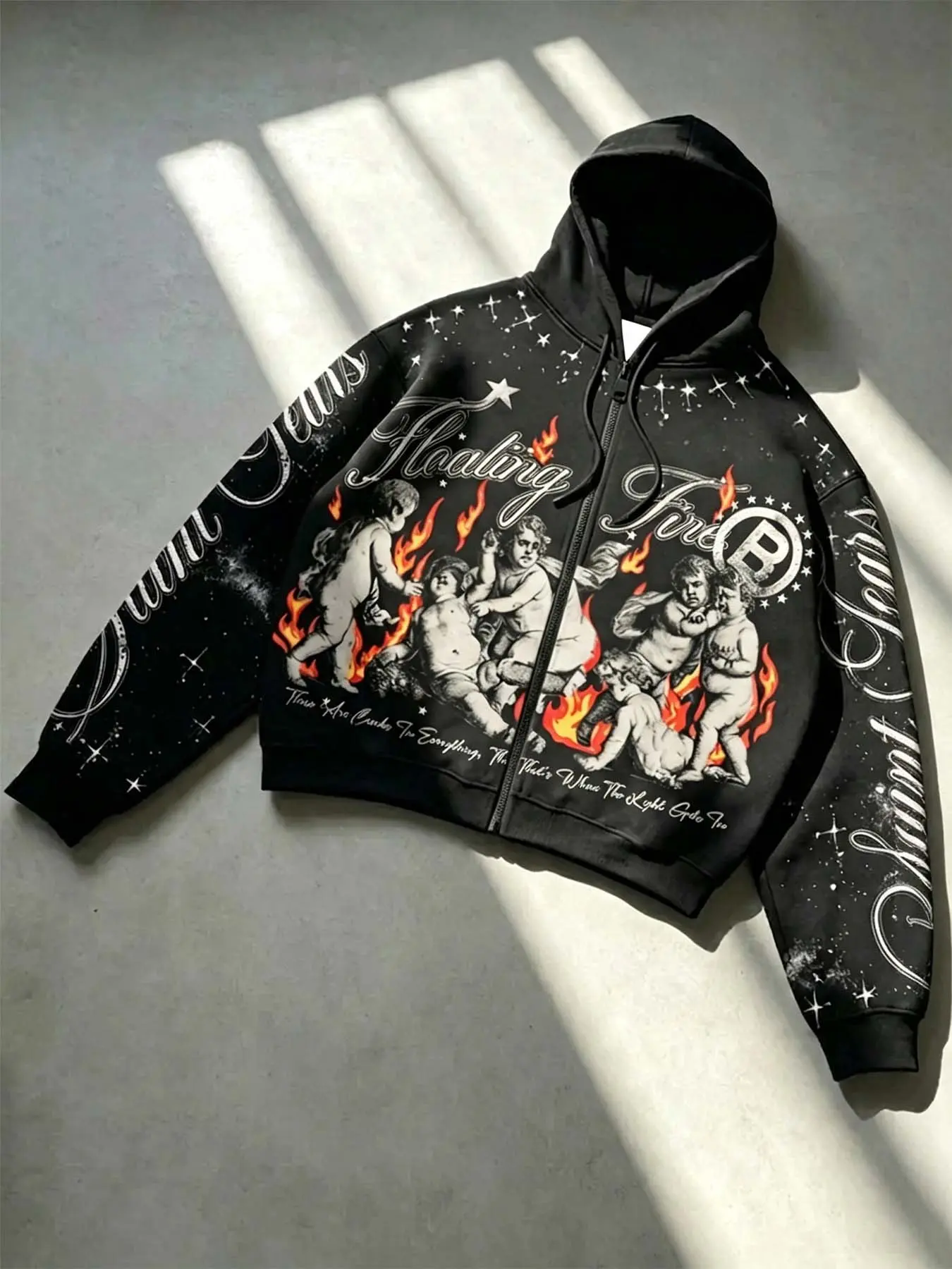 Black zip-up Loose hoodie jacket with a retro little angel fire full print, letter print on the sleeves, soft and comfortable fabric, gothic street-style zip-up hoodie, perfect for everyday casual wear #GothicHoodie #RetroStreet