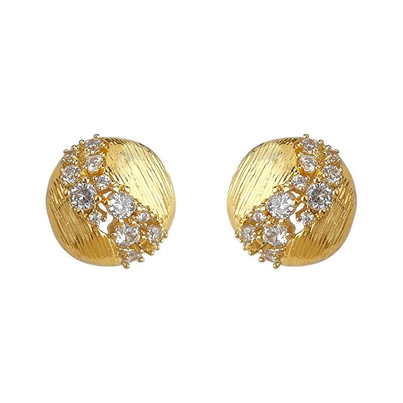 A pair of vintage style zirconia brushed round earrings, distinctive, luxurious, and sophisticated studs that are a versatile classic.