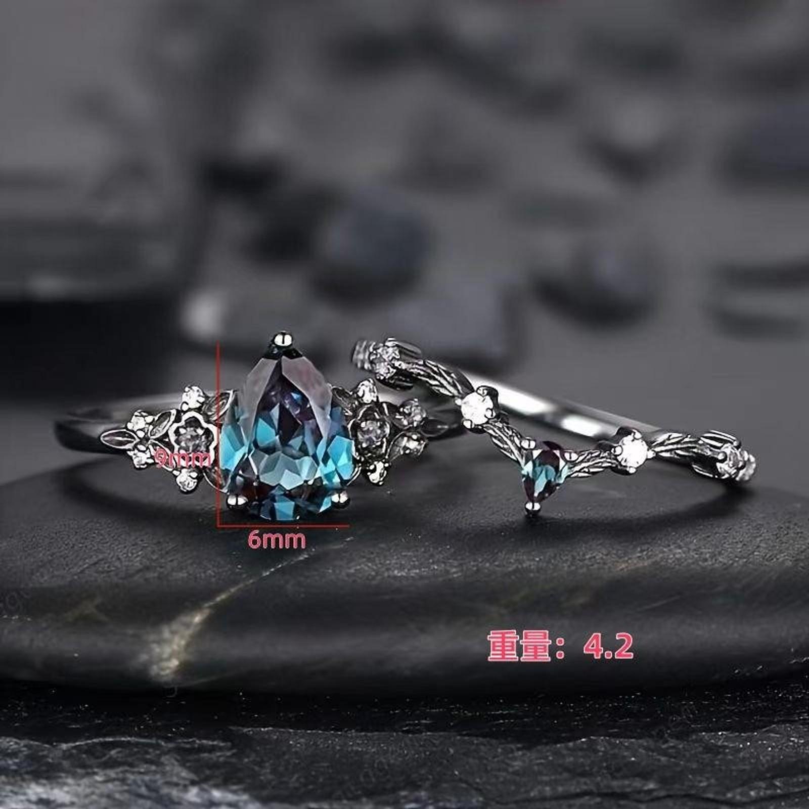Deluxe sense light luxury personality fashion water drop blue diamond couple ring