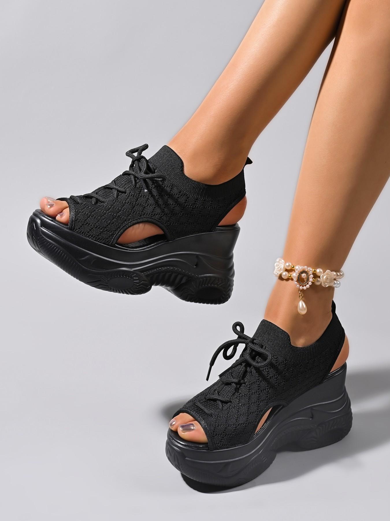 The new women's wedge heel sandals for the summer of 2026, with thick soles and high heels, are fashionable and stylish with a sponge sole. The fusion of fashion and comfort makes you the focus of summer. Fashionable Heeled Sandals